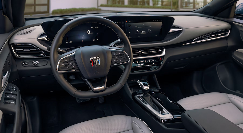 The steering wheel and digital screens in a 2024 Buick Envista Avenir.