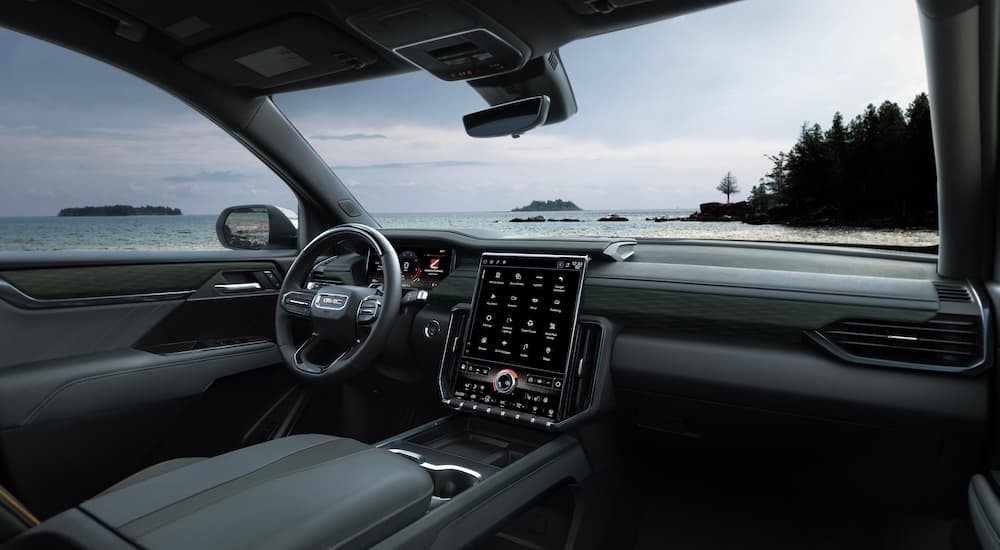 The interior of a 2025 GMC Acadia for sale is shown.
