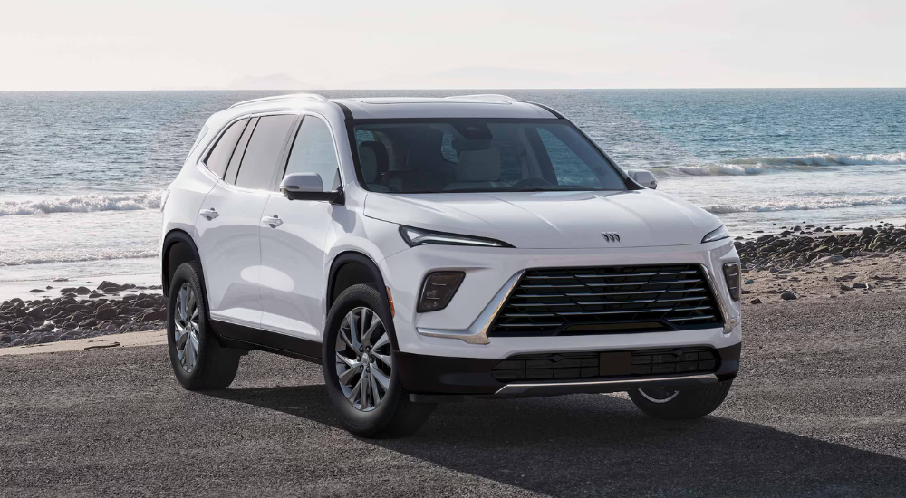 White 2026 Buick Enclave parked by the ocean