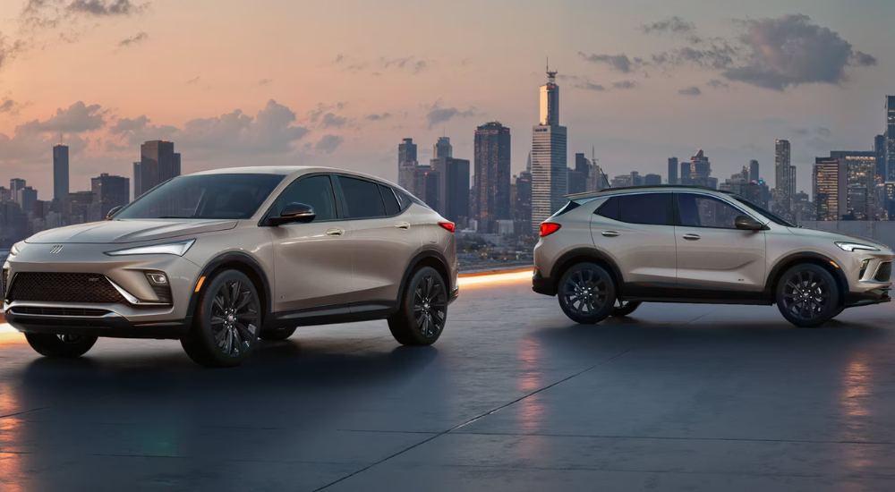 Champagne colored Studio Edition 2026 Buick Encore and Envista parked side by side