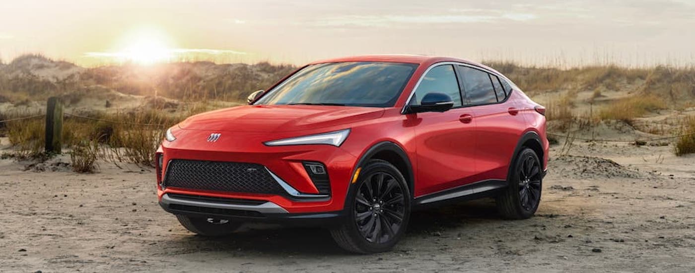 An orange 2024 Buick Envista ST is shown from the front at an angle.