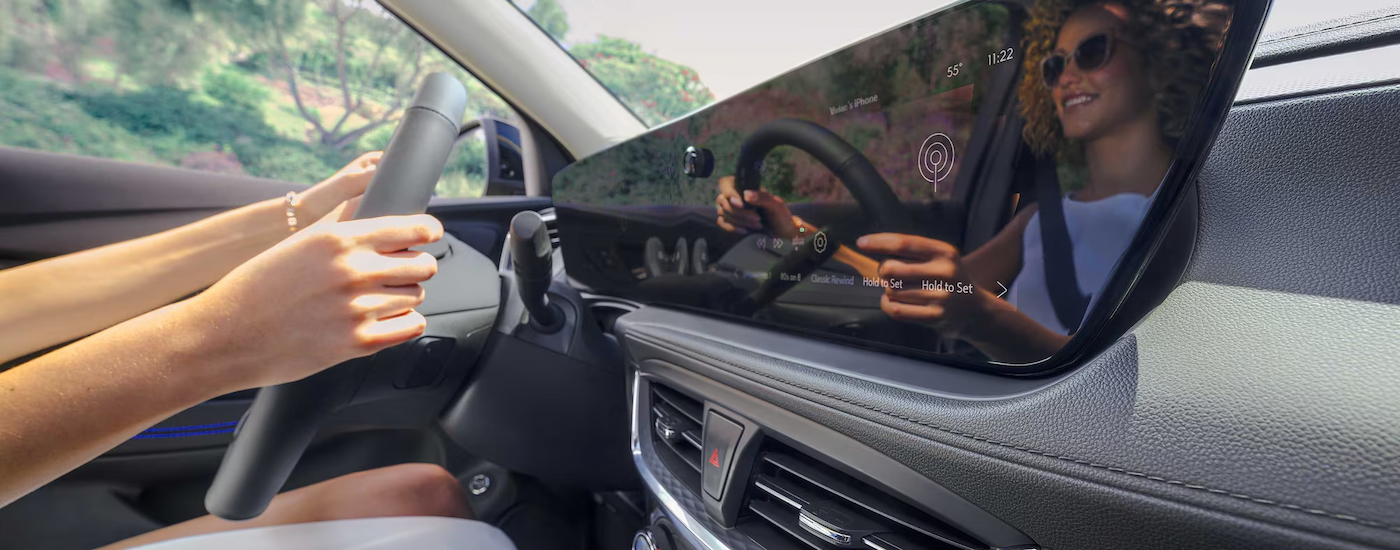 Woman driving in a 2025 Buick Encore GX