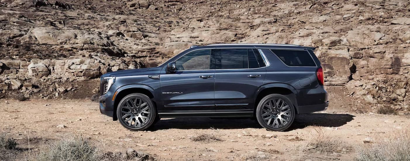 A blue 2025 GMC Yukon XL parked after visiting a GMC dealer near Perry.